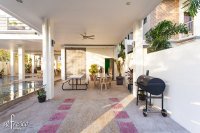 garage with grill and tables