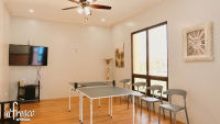 Entertainment room with ping pong table